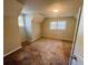 A second bedroom featuring carpeting, neutral walls and small windows allowing for natural light at 43 Oak Landing Cir, Douglasville, GA 30134