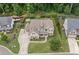 Beautiful home with lush landscaping and a spacious driveway at 4460 Hunters Walk Way, Cumming, GA 30028
