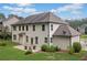 A large backyard offers a patio and well-maintained landscaping for relaxation and enjoyment at 4460 Hunters Walk Way, Cumming, GA 30028