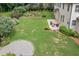 Large backyard with a patio and a garden, providing ample outdoor space at 4460 Hunters Walk Way, Cumming, GA 30028