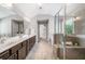 Spacious main bathroom has double sinks, private commode, stand alone shower, and soaking tub at 4460 Hunters Walk Way, Cumming, GA 30028