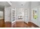 Bright office featuring French doors, hardwood floors, and ample natural light at 4460 Hunters Walk Way, Cumming, GA 30028