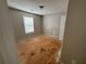 Secondary bedroom includes a closet, window, and neutral wall paint at 138 Shady View Pl, Lawrenceville, GA 30044