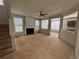 Inviting living room with fireplace, bright windows, and open layout to dining area at 138 Shady View Pl, Lawrenceville, GA 30044