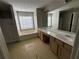 Primary bathroom features double sink vanity, a soaking tub, and separate shower at 138 Shady View Pl, Lawrenceville, GA 30044
