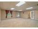 Large basement with ample space, carpet, and access to the backyard at 4655 Barnes Ct, Loganville, GA 30052