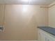 Unfinished basement area featuring a washer/dryer hookup and countertop cabinets at 4655 Barnes Ct, Loganville, GA 30052