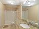 Bathroom featuring granite countertops and a shower-tub combination at 4655 Barnes Ct, Loganville, GA 30052