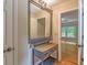 Hallway features a wooden table with drawers and a view into a bedroom at 4655 Barnes Ct, Loganville, GA 30052