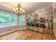 Gourmet kitchen featuring stainless steel appliances, granite countertops, and a breakfast bar with counter seating at 4655 Barnes Ct, Loganville, GA 30052