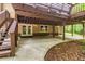Outdoor patio beneath a wooden deck at 4655 Barnes Ct, Loganville, GA 30052