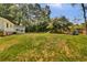 Spacious backyard with a playset, great for outdoor activities and Gathering fun at 4794 Glenbonnie Ct, Atlanta, GA 30360