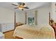 Bedroom featuring a four-poster bed, hardwood floors, and neutral finishes at 4794 Glenbonnie Ct, Atlanta, GA 30360