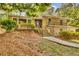 Charming two-story brick home with a manicured lawn, mature trees, and inviting front entry at 4794 Glenbonnie Ct, Atlanta, GA 30360