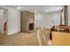 Open living room with a brick fireplace, carpeted floor, and a brown sofa at 4794 Glenbonnie Ct, Atlanta, GA 30360