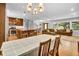 Open concept kitchen and dining area with a view to the living room at 4794 Glenbonnie Ct, Atlanta, GA 30360
