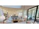 A bright and airy living room open to a modern kitchen, complete with a cozy seating area at 4820 Gadwall Way, Cumming, GA 30028