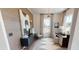 A modern home office space with wood-paneled walls, a large window, and stylish decor at 4820 Gadwall Way, Cumming, GA 30028