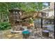 Backyard with gazebo, seating area, stone accents, and mature trees at 511 Pine Valley Se Rd, Marietta, GA 30067