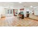 Bright finished basement has tiled floors and french doors to the back, perfect for an office or recreation space at 511 Pine Valley Se Rd, Marietta, GA 30067