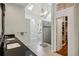 Bright bathroom with double vanity, skylights, walk-in shower, and soaking tub at 511 Pine Valley Se Rd, Marietta, GA 30067