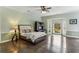 A serene bedroom with large windows, hardwood floors, and a cozy ambiance offers a peaceful retreat at 511 Pine Valley Se Rd, Marietta, GA 30067