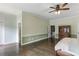 Spacious bedroom with hardwood floors, ensuite bathroom, and walk-in closet offers comfort and convenience at 511 Pine Valley Se Rd, Marietta, GA 30067