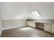 Bedroom with hardwood floors, built-in cabinets, counter space, and a skylight at 511 Pine Valley Se Rd, Marietta, GA 30067