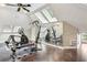 This bonus room has hardwood floors and skylights, and has mirrors for an exercise area at 511 Pine Valley Se Rd, Marietta, GA 30067