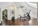 Spacious bonus room has hardwood floors, skylights, and is equipped for exercise with workout equipment at 511 Pine Valley Se Rd, Marietta, GA 30067