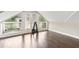 Bonus room with wood floors has access to a balcony through a double door, and is set up for exercise at 511 Pine Valley Se Rd, Marietta, GA 30067