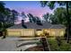 Charming home with a well-maintained lawn, a two-car garage, and a landscaped front yard with stairs at 511 Pine Valley Se Rd, Marietta, GA 30067