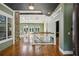Spacious foyer with hardwood floors, vaulted ceilings and direct view to a dining area with a chandelier at 511 Pine Valley Se Rd, Marietta, GA 30067