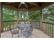 Outdoor gazebo with seating area and views of surrounding greenery at 511 Pine Valley Se Rd, Marietta, GA 30067