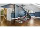 Spacious home gym featuring hardwood floors, neutral walls, and modern exercise equipment at 511 Pine Valley Se Rd, Marietta, GA 30067