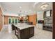 This gourmet kitchen features a dual island, stone counters, and stainless appliances at 511 Pine Valley Se Rd, Marietta, GA 30067