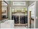 Convenient laundry room with modern mirrored cabinets at 511 Pine Valley Se Rd, Marietta, GA 30067