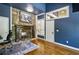 Charming living room boasts a stone fireplace and beautiful hardwood floors at 511 Pine Valley Se Rd, Marietta, GA 30067