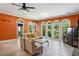 Bright living room with fireplace, large windows, and view of natural scenery at 511 Pine Valley Se Rd, Marietta, GA 30067