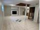 Spacious basement featuring a white-brick fireplace, tile flooring, and ample room for customization and entertainment at 915 Lake Dr, Snellville, GA 30039