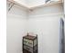 Spacious closet with wooden rod and storage unit for optimal organization and clothing or personal item storage at 285 Aspen Way, Fayetteville, GA 30214