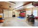 A spacious garage with room for multiple vehicles and other items, featuring ample lighting fixtures at 285 Aspen Way, Fayetteville, GA 30214