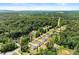 Picturesque aerial view of new construction homes surrounded by lush greenery and scenic landscapes at 2855 Pilgrim Mill, Cumming, GA 30041