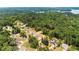 Aerial view of the community and surrounding area highlighting the wooded lot at 2855 Pilgrim Mill, Cumming, GA 30041