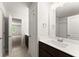 Bathroom featuring a single sink vanity with white countertop and dark wood cabinetry at 2855 Pilgrim Mill, Cumming, GA 30041