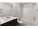 Bathroom featuring a bathtub and shower combination, single sink, and chrome fixtures at 2855 Pilgrim Mill, Cumming, GA 30041