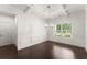 Dining room with dark hardwood floors, box ceilings and wainscoting at 2855 Pilgrim Mill, Cumming, GA 30041
