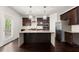 Kitchen featuring a large island, stainless steel appliances, and patio access at 2855 Pilgrim Mill, Cumming, GA 30041