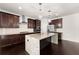 Gourmet kitchen with stainless steel appliances, granite counters, and custom cabinets at 2855 Pilgrim Mill, Cumming, GA 30041