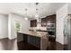 Kitchen with granite countertops, stainless appliances, and a large island at 2855 Pilgrim Mill, Cumming, GA 30041